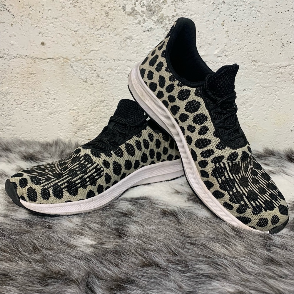 Leopard print/ irregular polka dot athletic shoe.